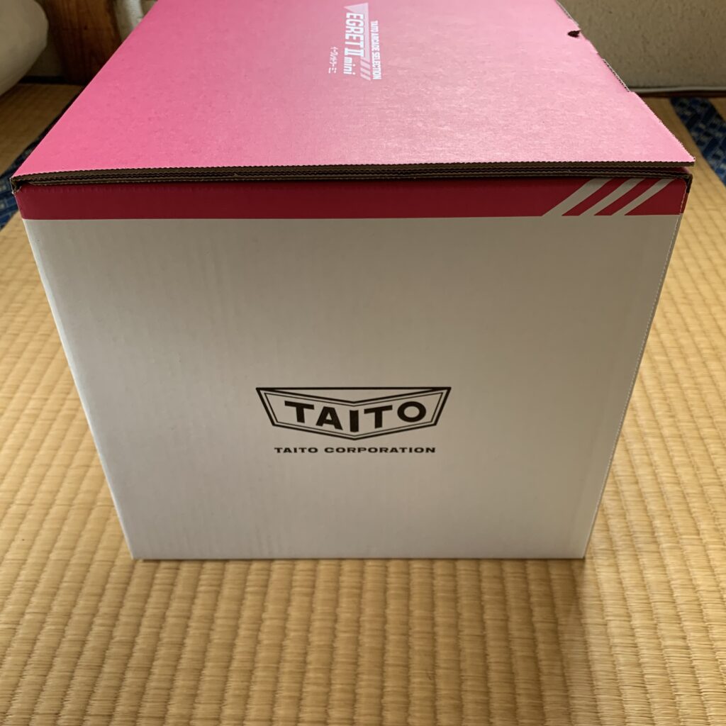 Side view with the wonderful Taito logo