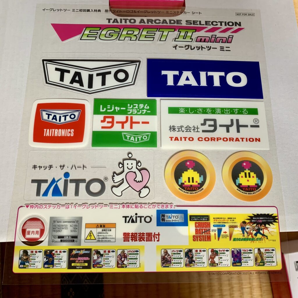 Stickers. Taito logo through the ages.