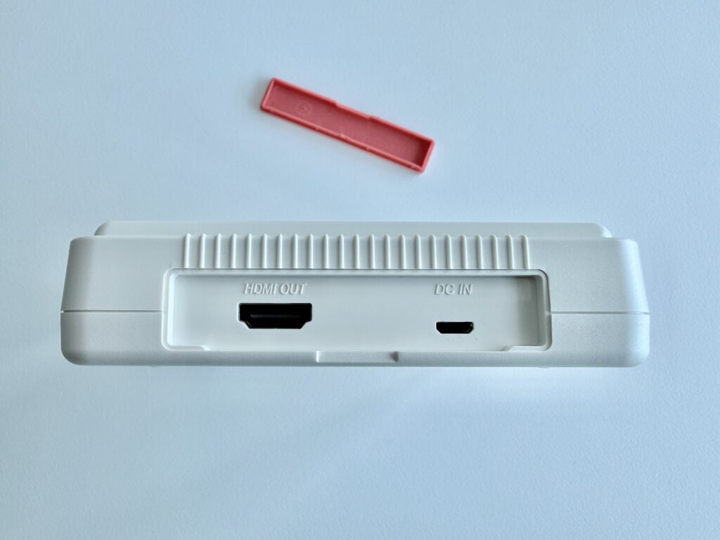 The HDMI and Micro USB ports under the cover